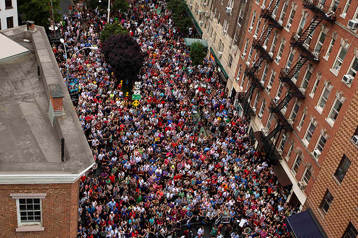 gay rights: A crowd gathers to listen to speakers near the Stonewall Inn in New York