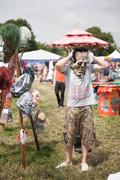 Glastonbury: A scarey mask stall by the Pyramid stage