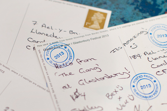 Glastonbury: Postcards written from the festival postal stall