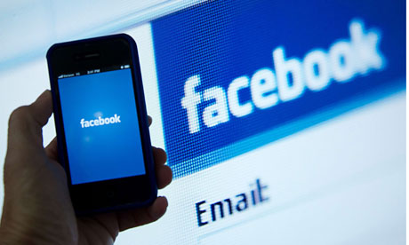 Facebook on phone and laptop