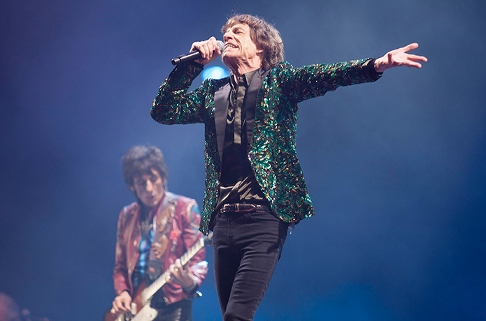 Rolling Stones: Mick Jagger and Ronnie Wood in the background