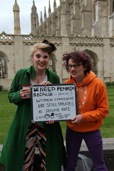 Student feminism: women holding whiteboard
