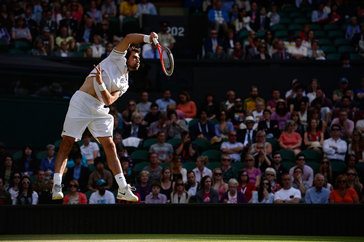 tom wimbo day 6: Jeremy Chardy serves 