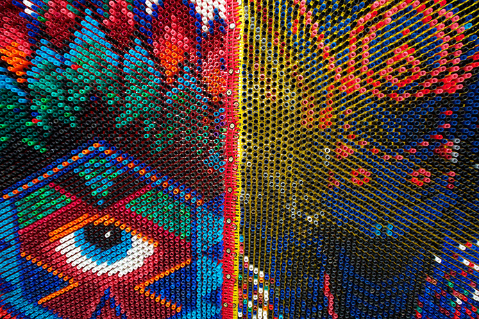 Shangri-La: A wall made out of bullet cases in a bar in hell