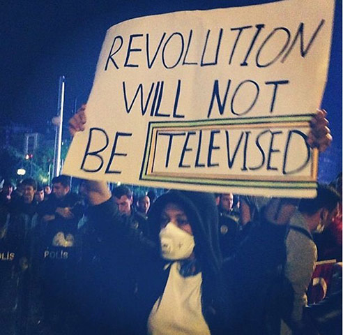 Turkey demonstrations: demonstrator holding sign