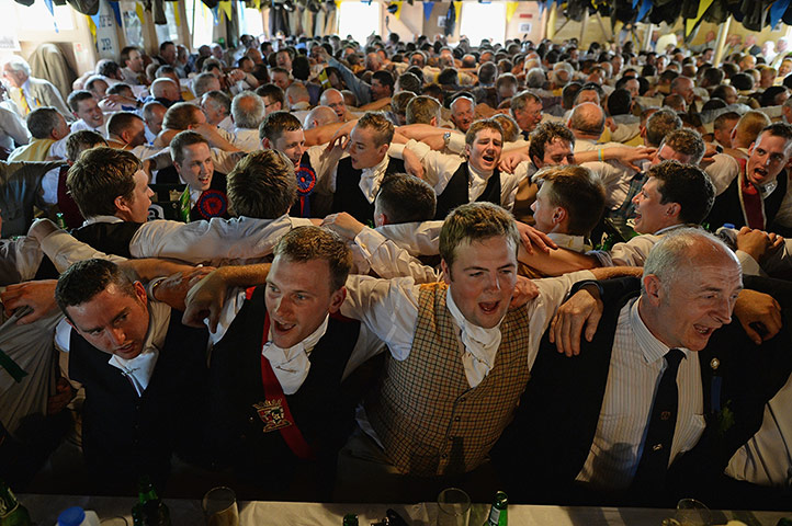 Hawick common riding: Riders and followers sing in the hut at St Leonard's 