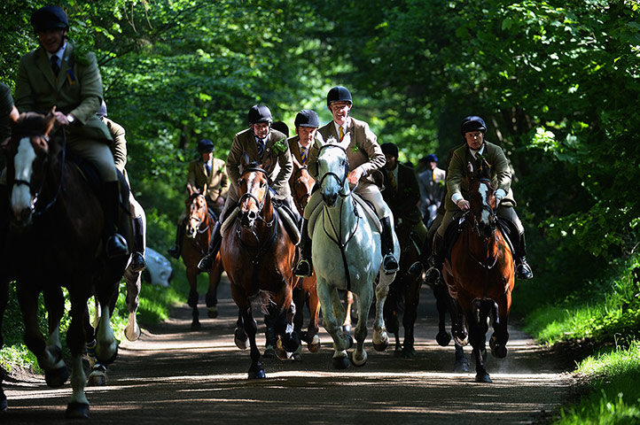 Hawick common riding: The principals, followed by up to 300 followers, gallop to the Nipknowes