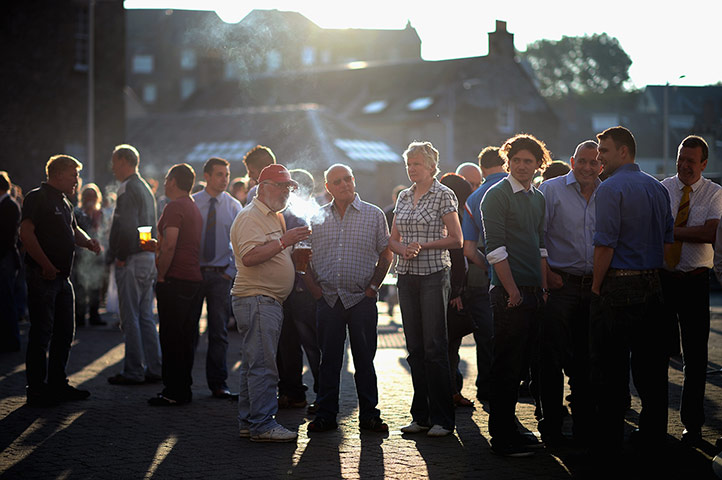 Hawick common riding: Men gather to watch the snuffin' by the site of Auld Brig