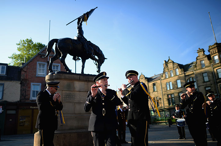 Hawick common riding: Halberdiers and the drum and fife band play to rouse the town