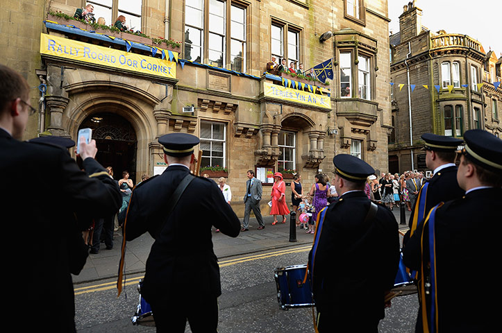 Hawick common riding: cornet Chris Ritson stands on the balcony of the town hall