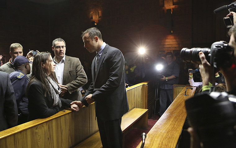 20 Photos: Oscar Pistorius with his sister Aimee at Pretoria Magistrates court