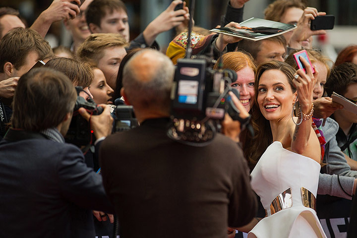 20 Photos: US actress Angelina Jolie poses for photos with fans in Berlin