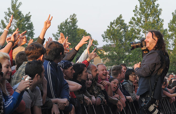 Stone Roses: A photographer snaps the crowd at Stone Roses concert