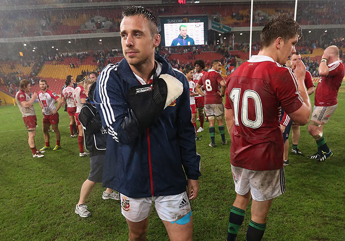 British  and Irish Lions v Reds: Tommy Bowe leaves the field with his right arm in a sling