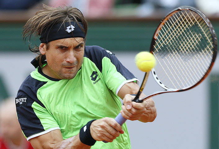 tennis: Spain's David Ferrer returns to Spain's