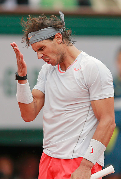 tennis4: Nadal of Spain reacts