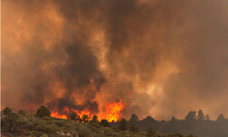 Flames on a ridge in the Yarnell Hill fire on Sunday.