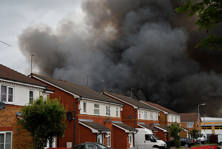 Smethwick fire: Smoke rises from a fire at a recycling plant in Smethwick near Birmingham