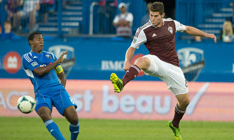 Montreal Impact's Patrice Bernier pulls back as Colorado Rapids' Dillon Powers jumps in