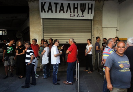 Municipal employees have occupied a municipal building in central Athens protesting a government's decision for suspension and possible future lay off of public servants, in Athens, Greece, 10 July 2013.