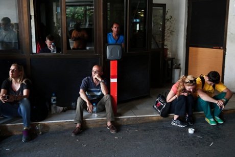 Athens' municipal employees take part in a protest outside the town hall of Athens July 10, 2013.