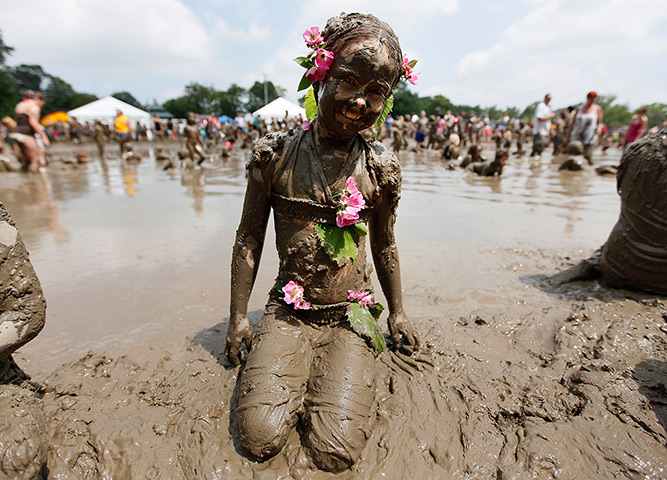 Annual mud day: Chelsea Crayne wears flowers 