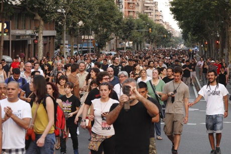 Hundreds of people demonstrated in Barcelona against political corruption and demanded the resignation of Prime Minister Mariano Rajoy, on 14 July 2013.