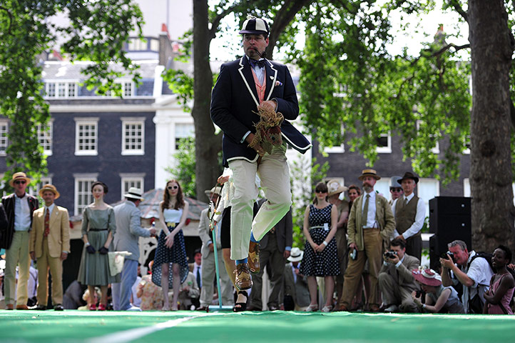 Chap Olympiad: A guest in a period costume rides a horse pogo stick.