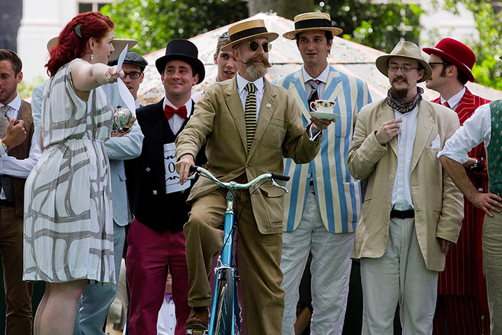 Chap Olympiad: A competitor prepares to participate in the passing the teacup event.