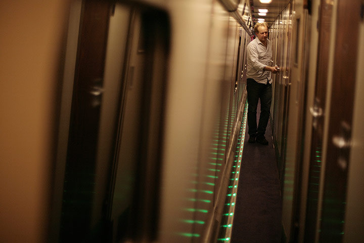 Night Riviera: A passenger gets ready to turn in for the night