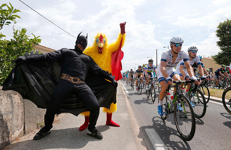 cycling fans: Fans dressed in costumes
