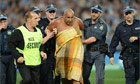 Streaker escorted off