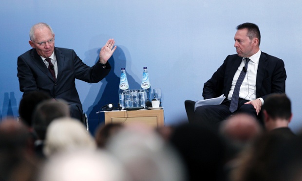 German Finance Minister Wolfgang Schaeuble, left, delivers a statement alongside his Greek counterpart Yannis Stournaras during a German-Greek chamber of industry and trade event, in Athens, Thursday, July 18, 2013.