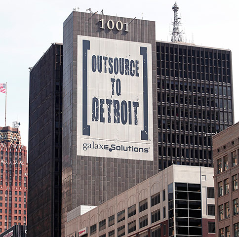 motor city blues: A banner on a building in is shown in downtown Detroit 