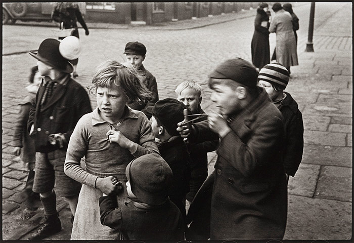 More Mass Observation: Children hanging around by Humphrey Spender 