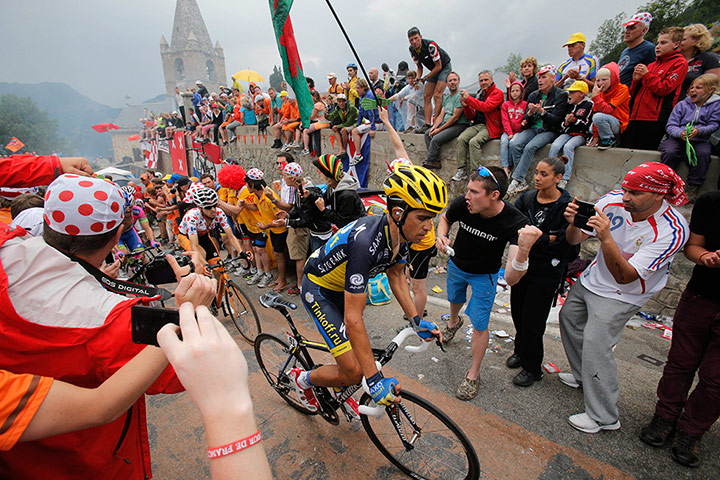 Tour de France Stage 19: Contador, right, and Mikel Nieve Iturralde climb towards Alpe-d'Huez