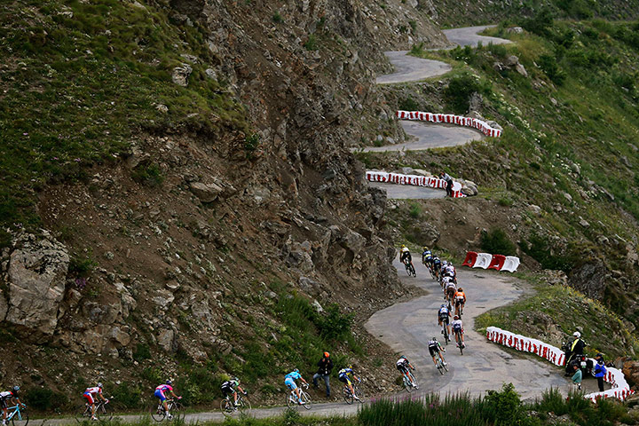 Tour de France Stage 19: The pack rides in the Col de Sarenne during Stage 18