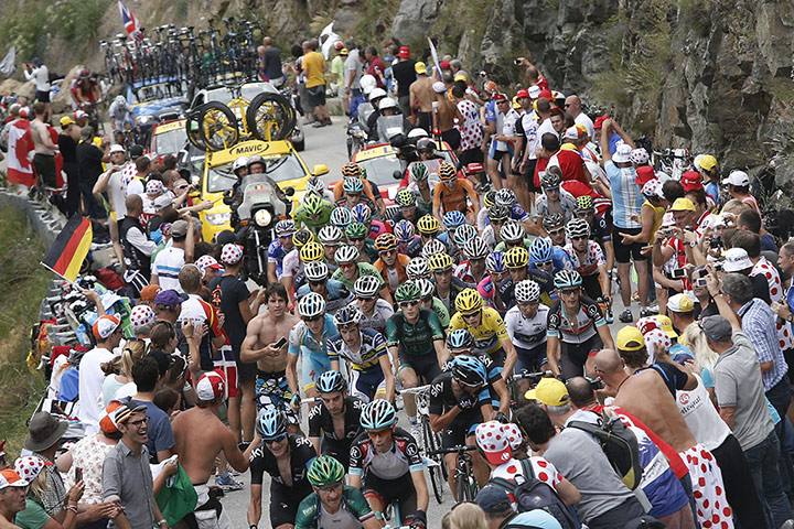20 Photos: Britain's Chris Froome climbs Alpe d'Huez during the Tour de France