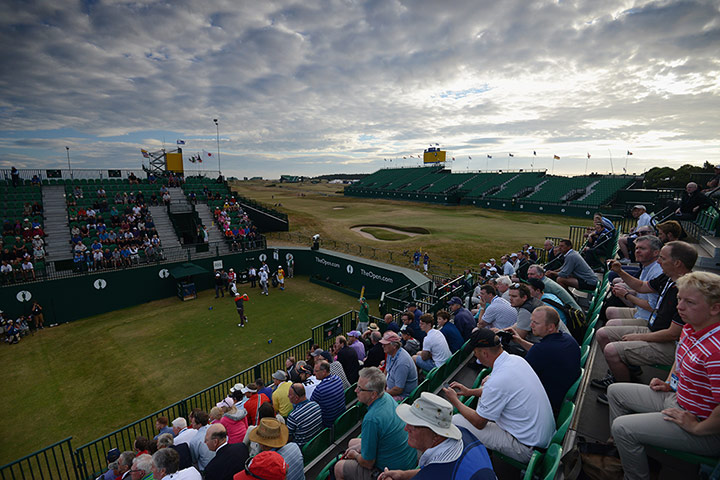 Open Golf : Oliver Fisher of England tees off on the 1st hole 