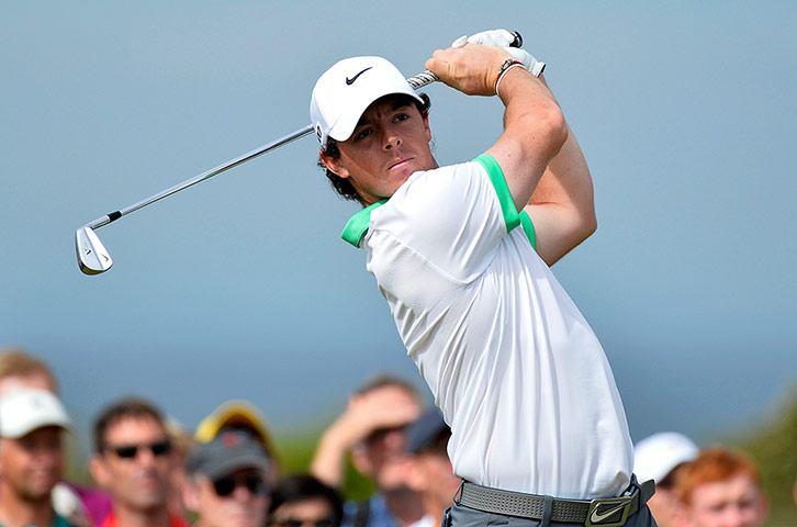 Open Golf : Rory McIlroy of Northern Ireland watches his tee shot on the fourth