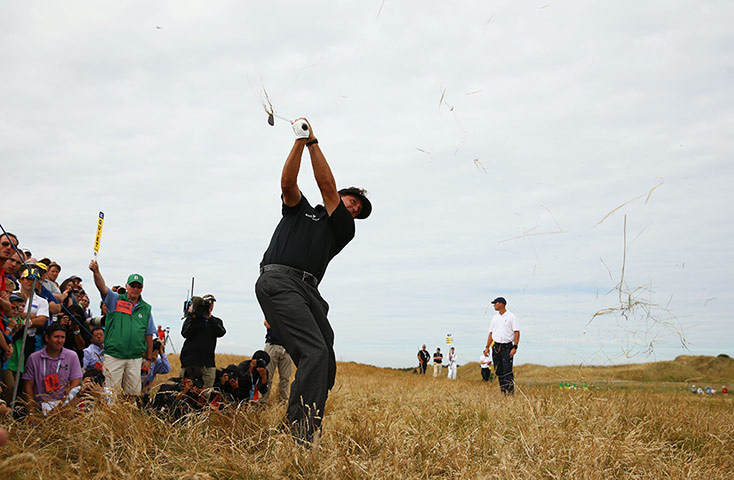 Open Golf : Phil Mickelson of the United States hits from the rough on the 5th