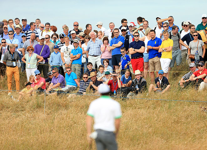 Open Golf : Rory McIlroy is watched by the crowd during day one