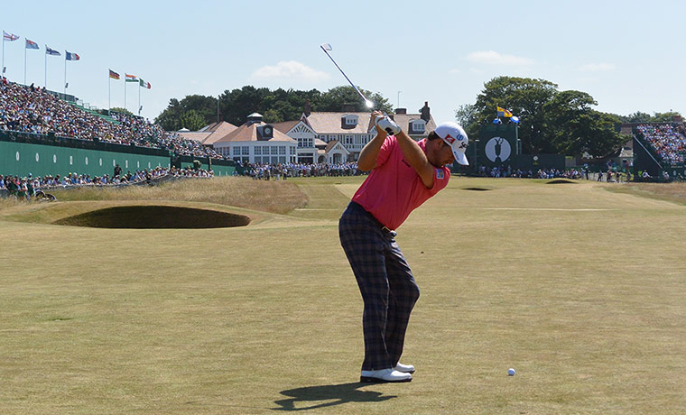 Open Golf : Graeme McDowell of Northern Ireland hits his 2nd shot on the 18th hole