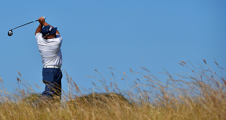 Open Golf : Angel Cabrera of Argentina watches his tee shot on the sixth hole