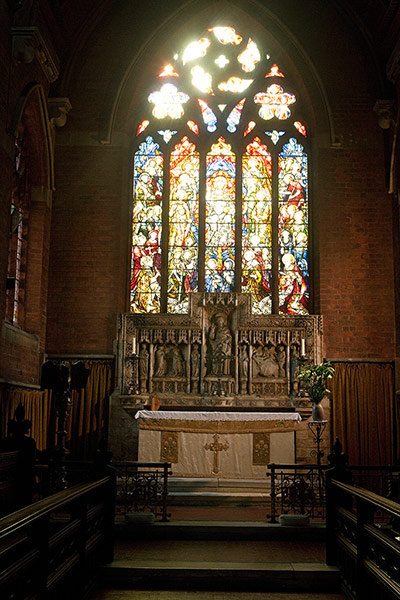 CofE: The altar and stained glass window