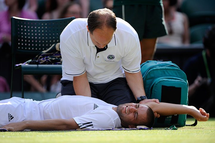 Tom Jenkins Wimbledon 7: Mikhail Youzhny gets treatment