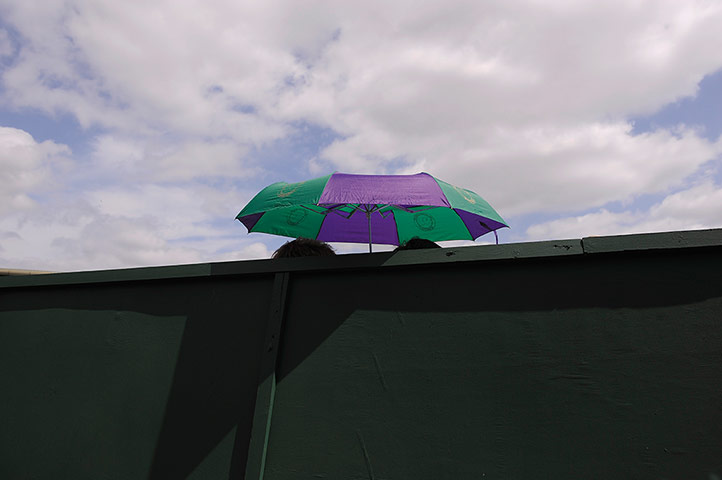 Tom Jenkins Wimbledon 7: Fans under an umbrella