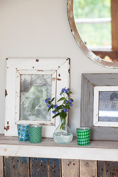 Homes - Bristol House - Matlepiece with flowers and photographs
