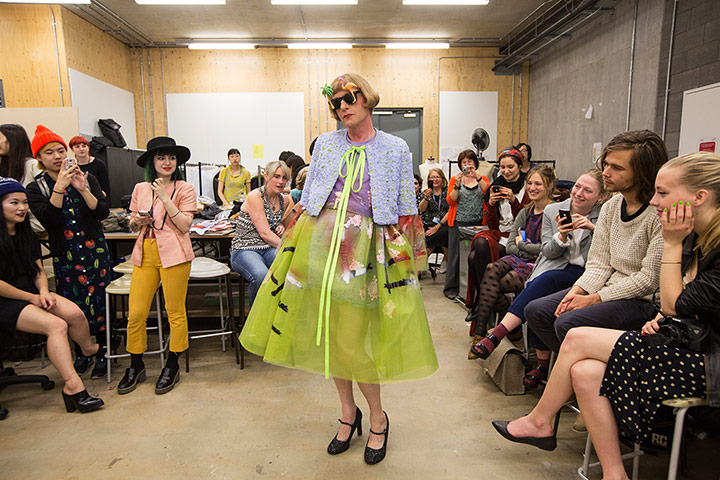 Grayson Perry models a dress by Tinghzu Lau