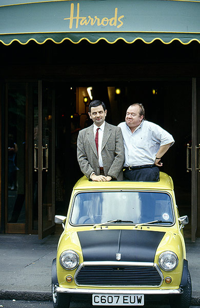 Mel Smith: Rowan Atkinson filming Mr Bean outside Harrods, London, Britain - 1996